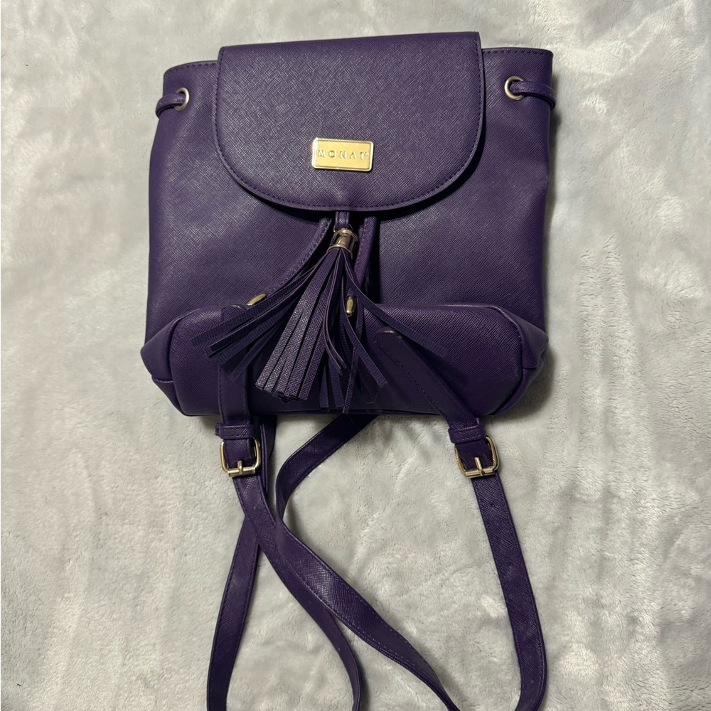 Purple faux leather backpack